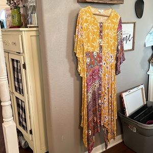 Adorable Bohemian dress. 🌺